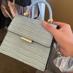 Light blue cross body